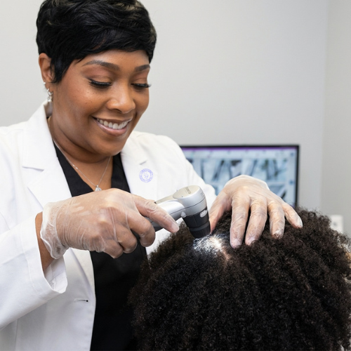 Donecia Sullivan performing a professional scalp analysis in Augusta, Georgia