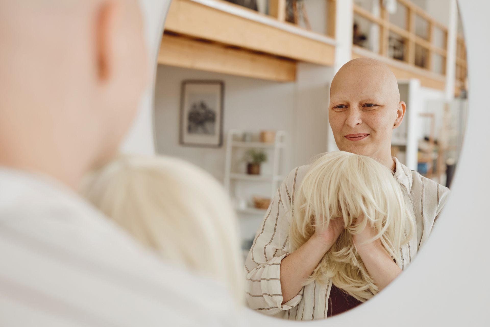 Woman considering a natural-looking medical wig